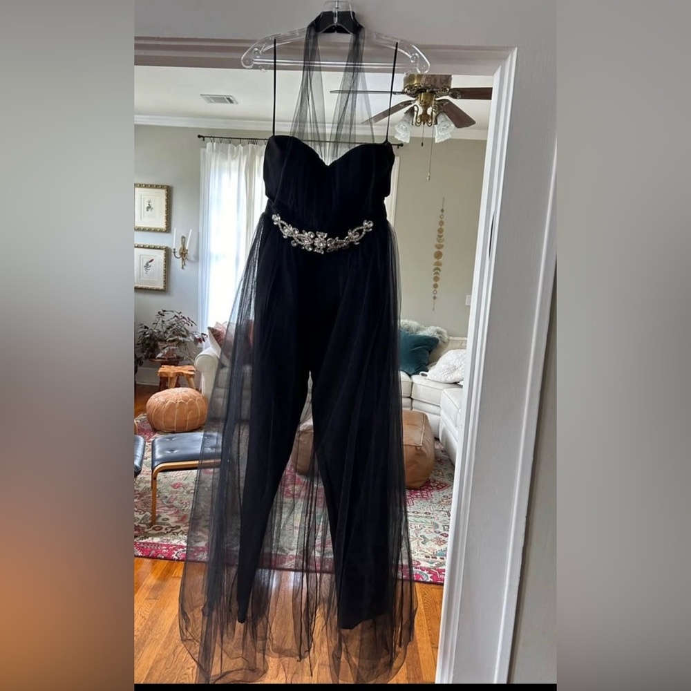 Elegant Black Strapless Jumpsuit with Embellished Waist and tulle train